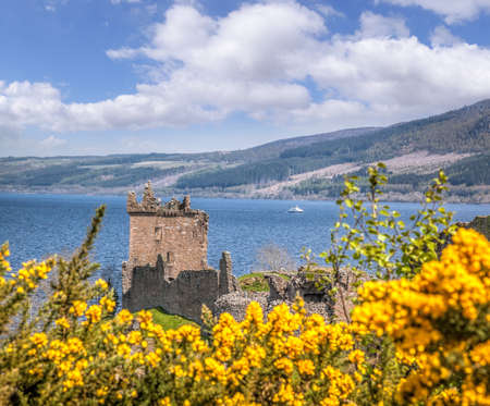 Ruins of Urquhart Castle with famous lake Loch Ness in Scotlandの写真素材