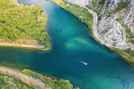 Boat in the canyon on the Cetina river near Omis, Croatia, Europeの写真素材