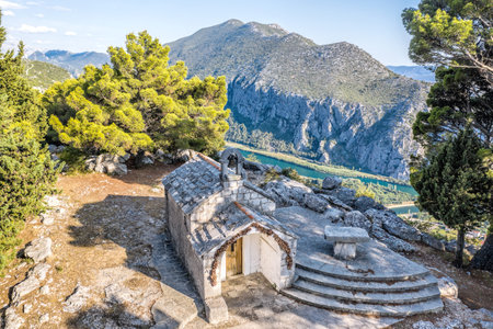 Church of St. George above the canyon with Cetina river near Omis, Croatiaの写真素材