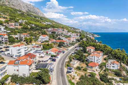 Stanici village with main road along the coast next to Omis town in Croatiaの写真素材