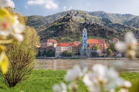DÃ¼rnstein village with Danube river during spring time in Wachau, Austriaの写真素材