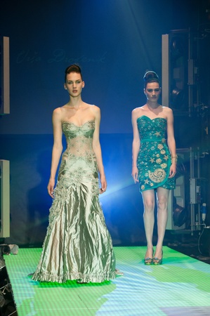 IDRIJA, SLOVENIA - JUN 18: Models in Urska Drofenkis creation with idria lace on fashion show at...