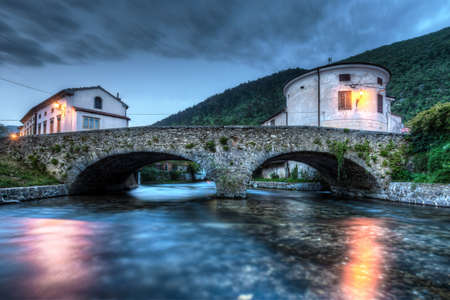 Bridge over Vipava river at duskの写真素材