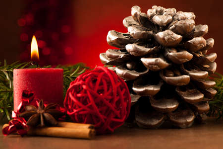 Pine cone and candle cristmas decorationの写真素材