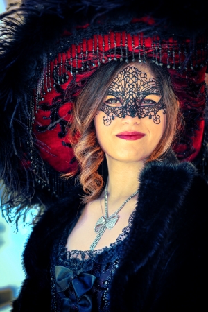 VENICE, ITALY - FEBRUARY 8: Unidentified person in Venetian masks at St. Mark's Square, Carnival of Venice on February 8, 2013. The annual carnival is from February 2 to February 12, 2013.のeditorial素材