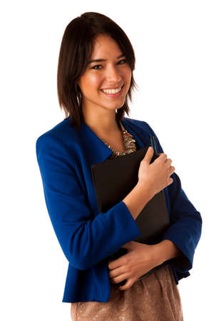 Attractive asian caucasian business woman holding a folder in her handsの写真素材