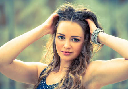 Beautiful young woman outdoor in urban environmentの写真素材