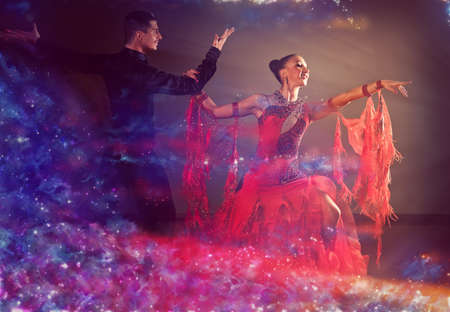 Professional ballroom dance couple preform an romantic exhibition danceの写真素材