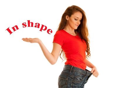 Woman lost weight and her trousers are too big - healthy lifestyleの写真素材