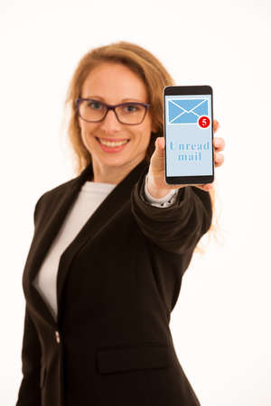 Young business woman with smart phone isolated over white background