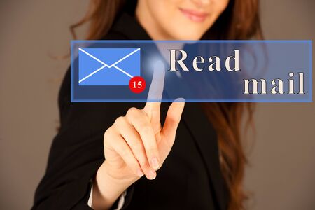 Attractive business woman pressing a virtual button