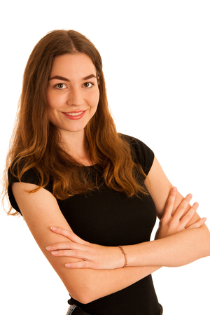 attractive young woman in jeans and black t shirt isolated over white backgroundの写真素材