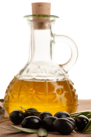 Bottle of olive oil isolated over white background .の写真素材