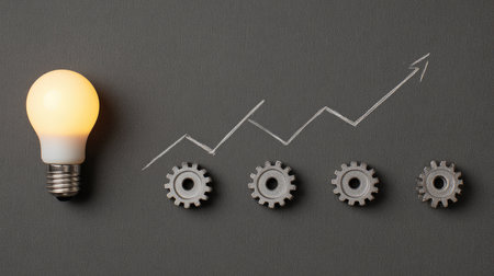 Business innovation layout with light bulb, gears, and upward performance chartの素材