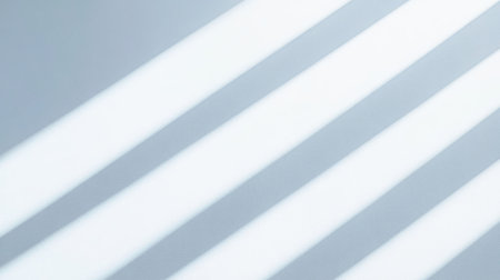 Minimalist white gradient background with subtle light shadows for clean and professional layoutsの素材