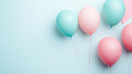Pastel color background with balloons floating upward, giving a light and cheerful festive feelの素材