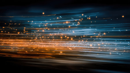 A mesmerizing abstract image showcasing colorful light trails in motion blur, blending blue and orange hues against a dark background, creating an energetic visual treat.の素材