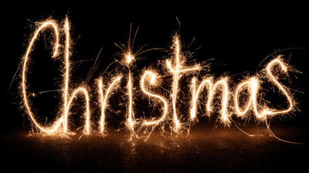 This captivating image showcases the word 'Christmas' created with sparklers against a dark background, embodying the spirit of celebration and joy during the holiday season.の素材