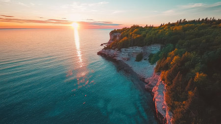 Captivating sunset illuminates cliffs and calm waters, showcasing nature's beauty. Perfect for travel, landscape, and outdoor photography themes.の素材