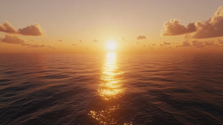 Experience the serene beauty of a tranquil sunset over calm ocean waves. Soft sunlight reflects on the water, creating a warm and peaceful atmosphere.の素材