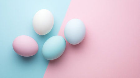 A visually striking arrangement of colorful Easter eggs on a split pink and blue background, creating a playful and festive atmosphere perfect for spring celebrations.の素材