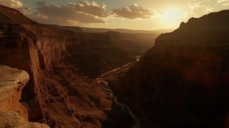 A stunning view of the Grand Canyon at sunset, showcasing vibrant colors and unique rock formations under a dramatic sky. Perfect for nature lovers.の素材