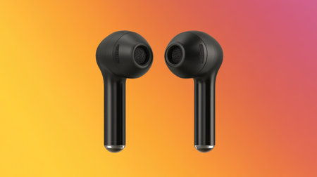 Showcase of wireless earbuds against a vibrant gradient background, highlighting sleek design and modern technology for an enhanced listening experience.の素材