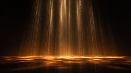 A beautiful display of golden light beams falling from above, creating a mesmerizing scene that evokes feelings of tranquility and wonder in a dark ambiance.の素材