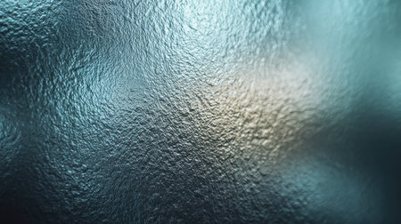 This textured glass surface features intricate patterns and light distortions, providing a captivating abstract background ideal for creative design projects.の素材
