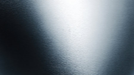 This image features a smooth metallic texture with a subtle gradient and light reflection, making it perfect for backgrounds and various design applications.の素材