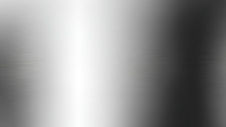 This image features a smooth gradient of silver and dark gray, creating a sleek metallic texture ideal for modern design, backgrounds, and abstract artwork.の素材