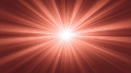This vibrant image features a radiant burst of light with dramatic rays spreading across a warm gradient background, perfect for creative and artistic projects.の素材
