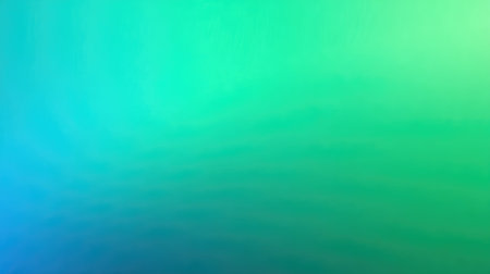 This vibrant abstract background features a smooth blend of blue and green hues, perfect for creative projects, presentations, or as a calming wallpaper option.の素材