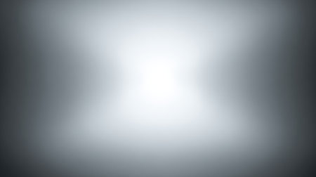 This abstract light background presents soft gradients in grey tones, evoking feelings of serenity and depth, perfect for various creative and design projects.の素材