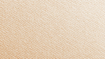 A soft beige textured background that mimics the look of handcrafted paper, offering a warm, inviting aesthetic ideal for artistic or design applications.の素材