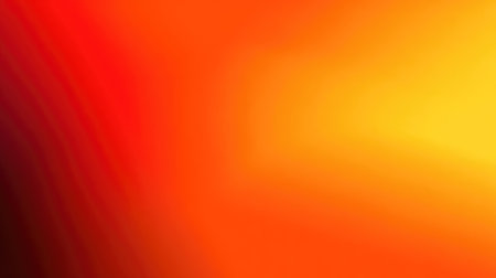 This vibrant abstract gradient background features stunning shades of red, orange, and yellow, creating a warm and energetic atmosphere ideal for creative projects.の素材
