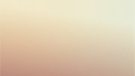 A soft gradient background featuring gentle tones of peach and cream, perfect for a variety of design applications, including digital art and print projects.の素材