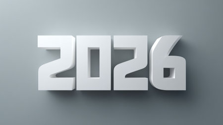 This image features a sleek and modern design of the year 2026 in white against a soft gray backdrop. It represents themes of innovation, future planning, and inspiration.の素材