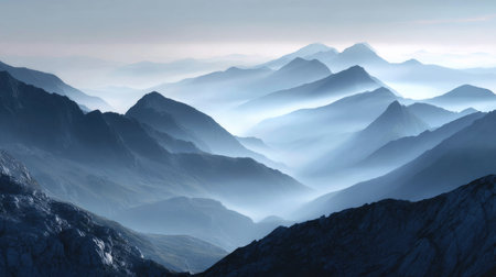 Explore a breathtaking landscape of misty mountains layered in soft blue hues. This tranquil scene evokes a sense of peace and connection to nature's beauty.の素材