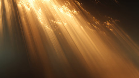 Experience the breathtaking beauty of soft golden rays emerging through clouds during sunset, creating a serene and magical atmosphere. Perfect for nature themes.の素材
