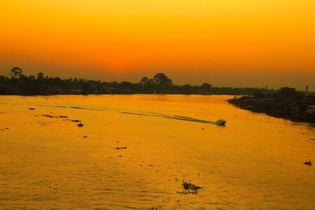 sunset with the riverの写真素材
