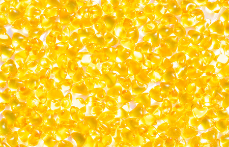 Golden heart color pills of fish oil for healthy and for a gift of valentines dayの写真素材