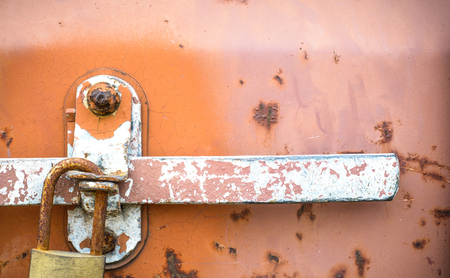 Texture and background of the old lock with rusty on iron boxの写真素材