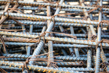 Background of Iron and bundled bars ready for construction with black and white colorの写真素材