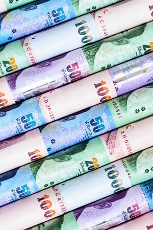 Colorful background  of Thai currency,banknotes rollの写真素材