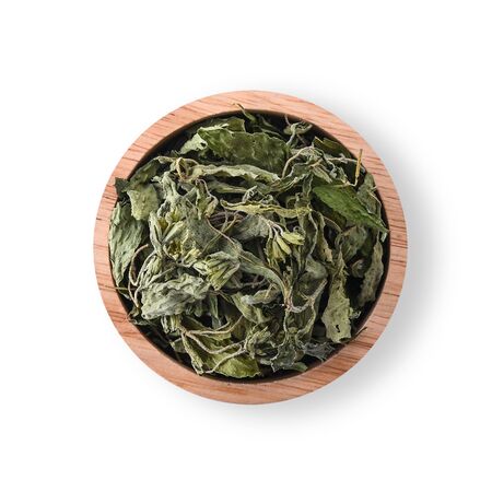 Stevia is dried in the rice bowl Isolated on a white background.の写真素材