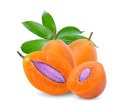 Closeup sweet Marian plum thai fruit Cut in half isolated on white background (Mayongchid or Maprang or Marian Plum and Plum Mango,Thailand)の写真素材
