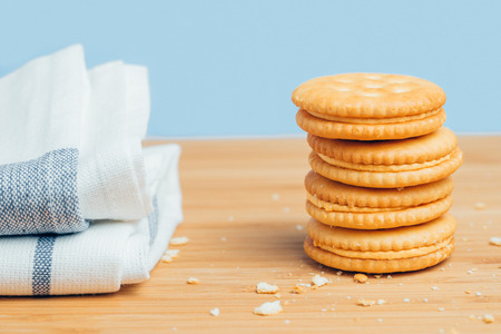 stack of cracker on wood boardの写真素材