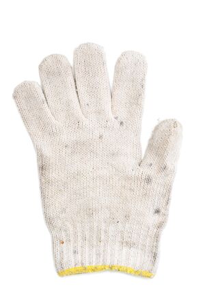 old used white glove yarn on white backgroundの写真素材