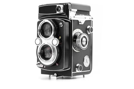 Vintage camera isolated on white backgroundの写真素材